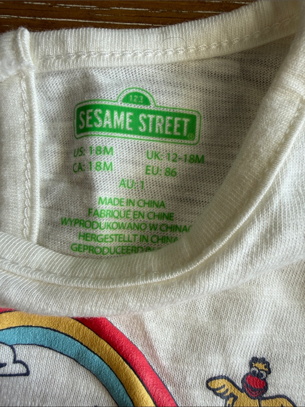 Sesame Street White Tee with Multicolor Character Print and Ruffle Sleeves - Picture 3 of 3